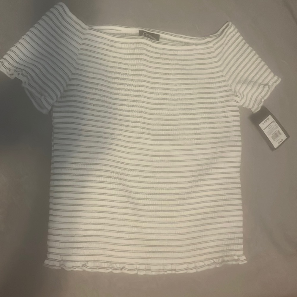 Striped white and black T-shirt,same design on back. And from target